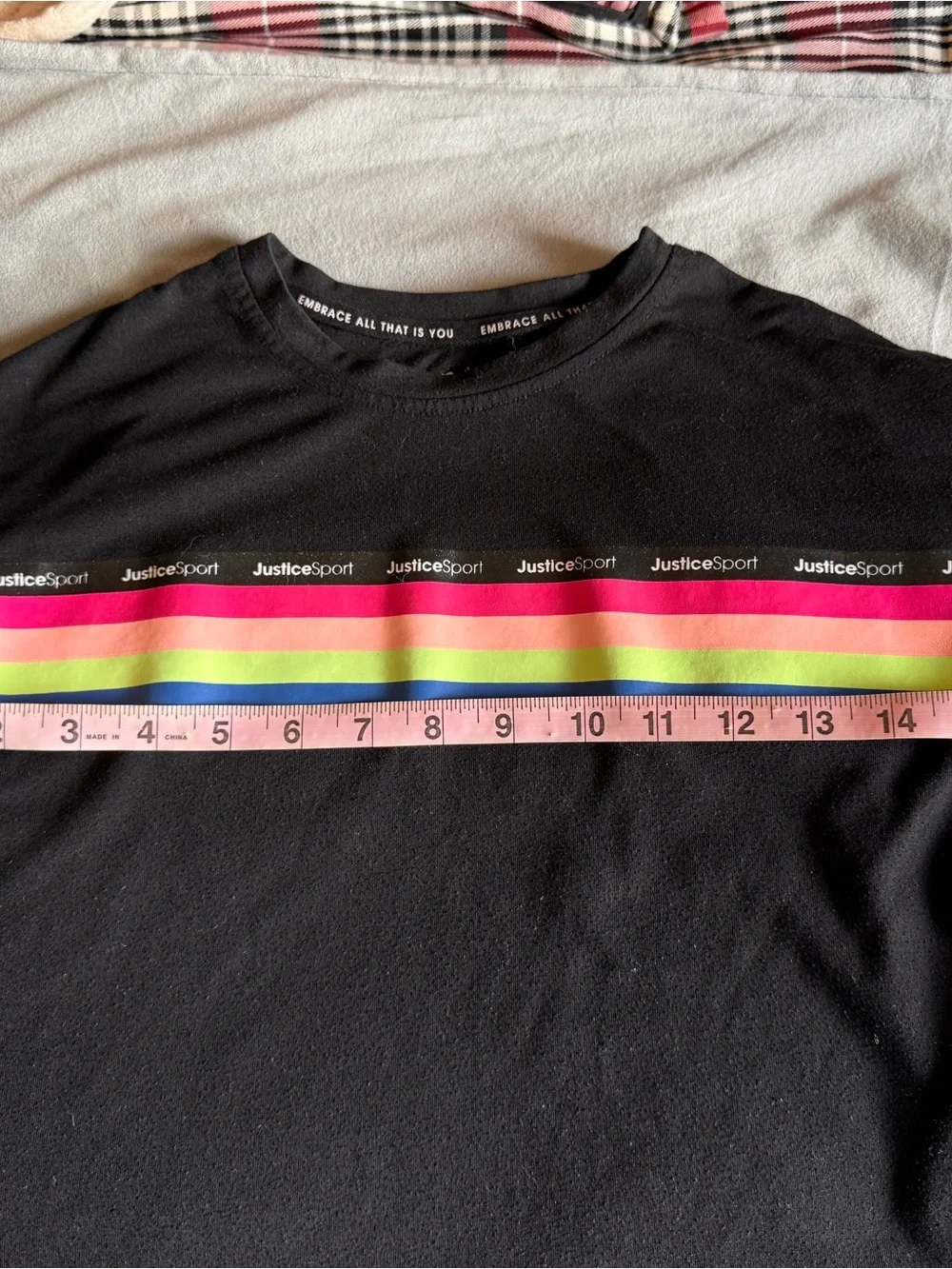 Justice black tee with rainbow stripe